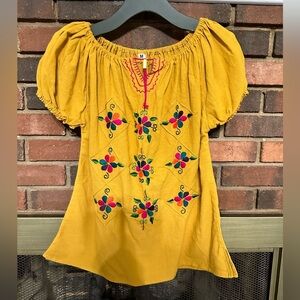 #8)   cute yellow with floral embroidered crop top.